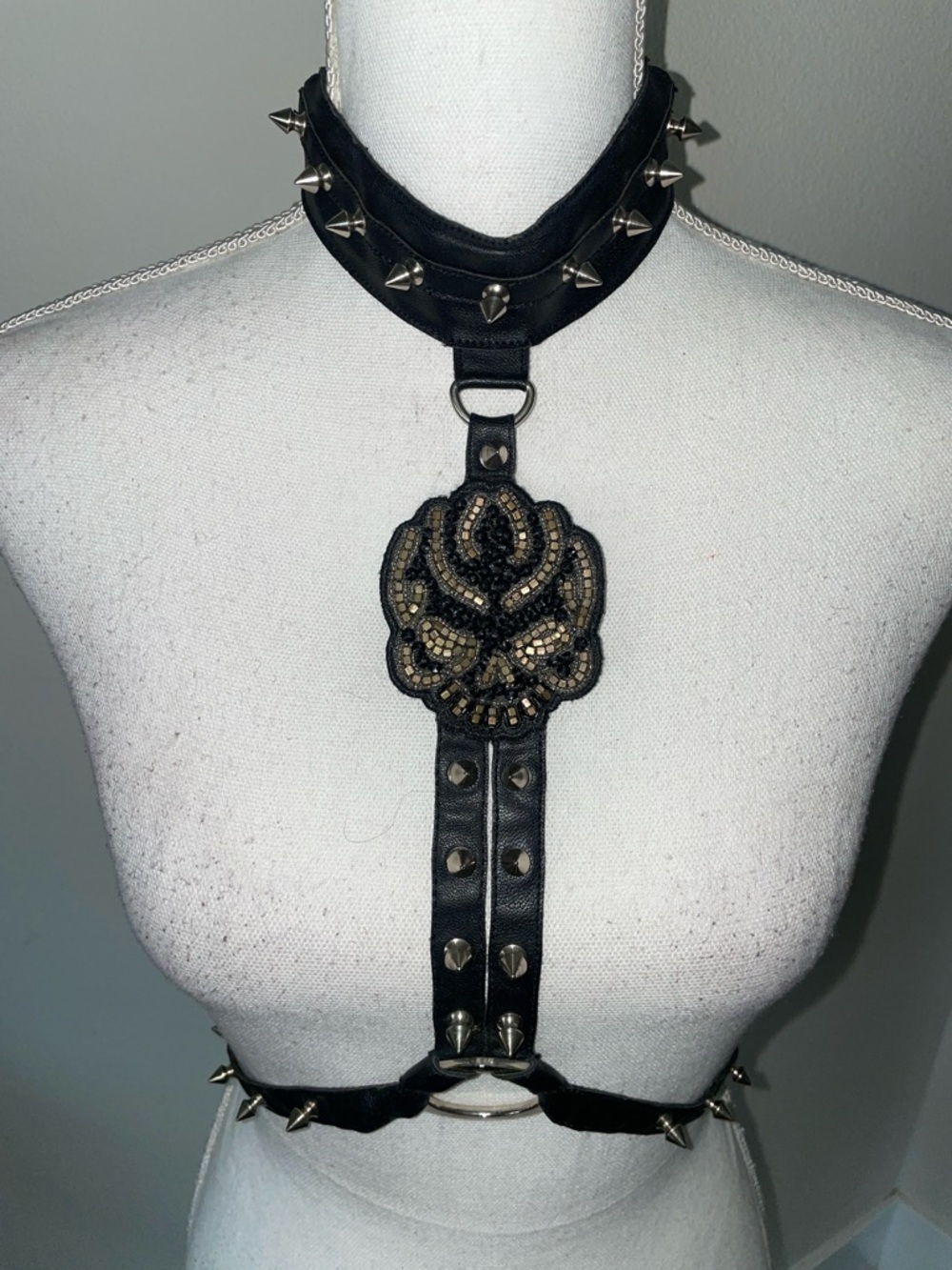 Black Studded Harness Necklace with Decorative Medallion